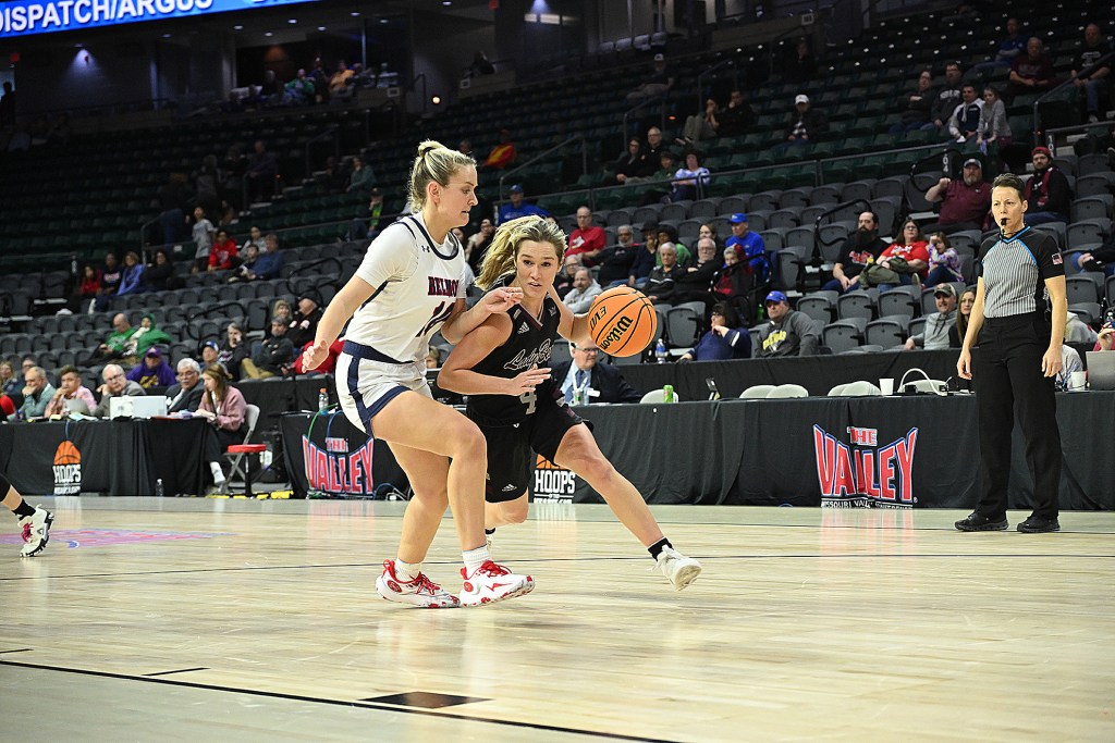 Missouri State guard Lacy Stokes drives to the basket.