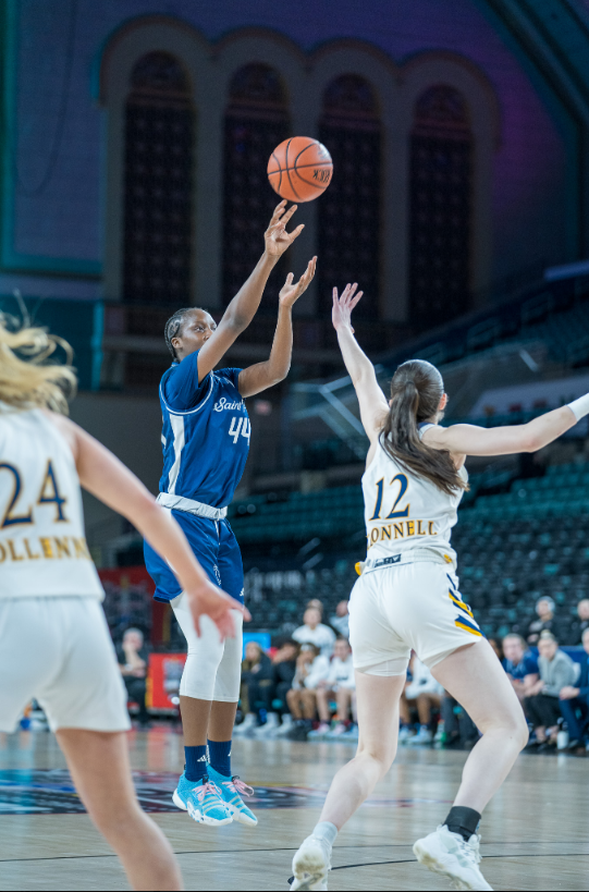 Saint Peter's forward Fatmata Janneh shoots a right-handed jump shot.