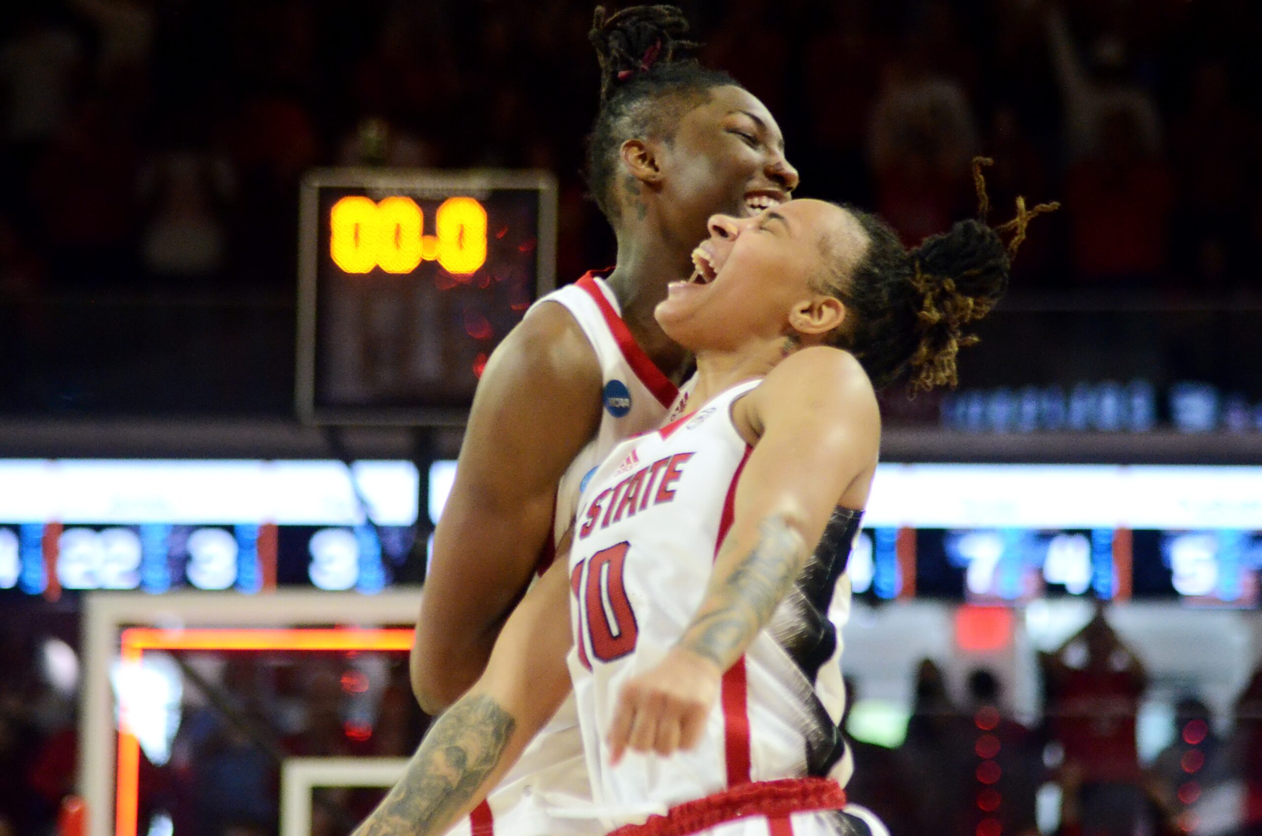 Aziaha James and Saniya Rivers celebrate as N.C. State beats Tennessee in the second round of the NCAA Tournament on Monday, March 25, 2024, at Reynolds Coliseum in Raleigh, N.C. (Mitchell Northam / The Next)