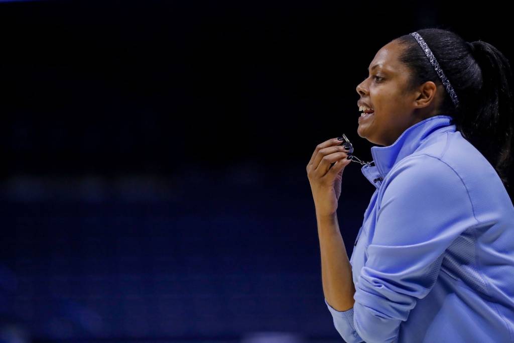 Xavier coach Billi Chambers watched on-court action while holding a whistle