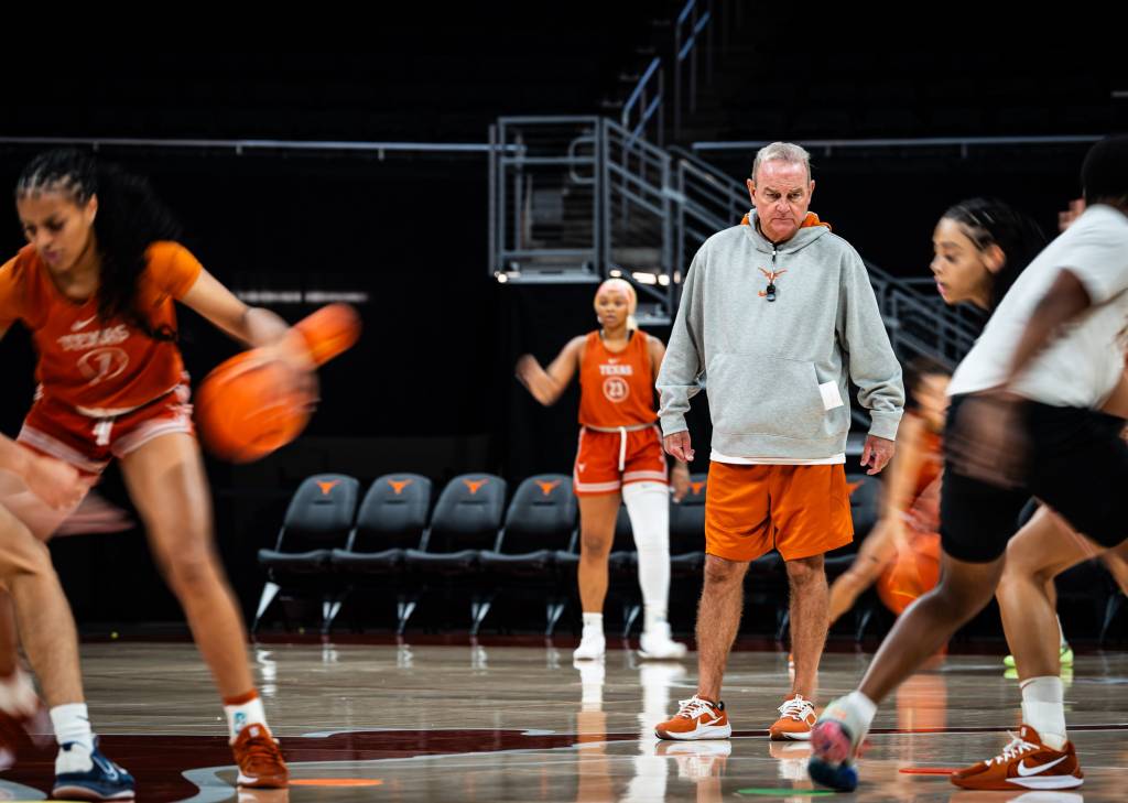 Texas head coach Vic Schaefer watches his team during a practice.