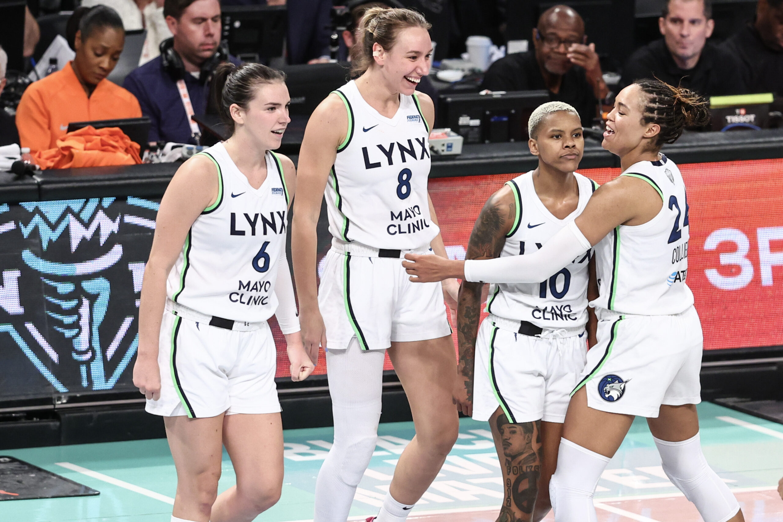 Minnesota Lynx guard Courtney Williams (10) celebrates with her teammates