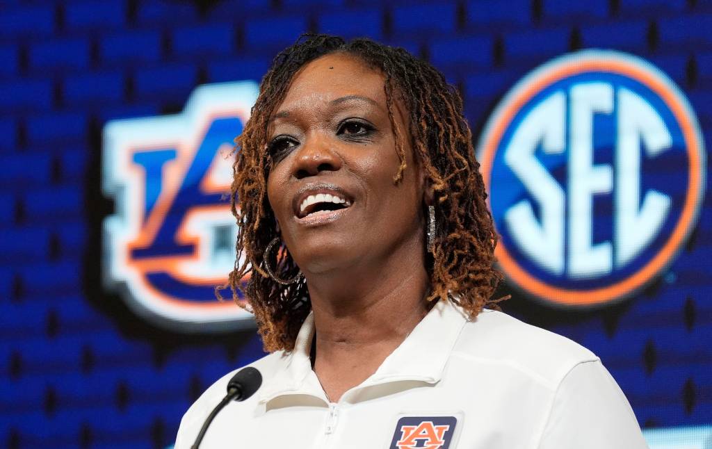 Auburn head coach Johnnie Harris addresses the media during SEC media day.