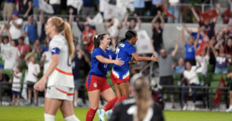 Celebrating after Alyssa Thompson's goal