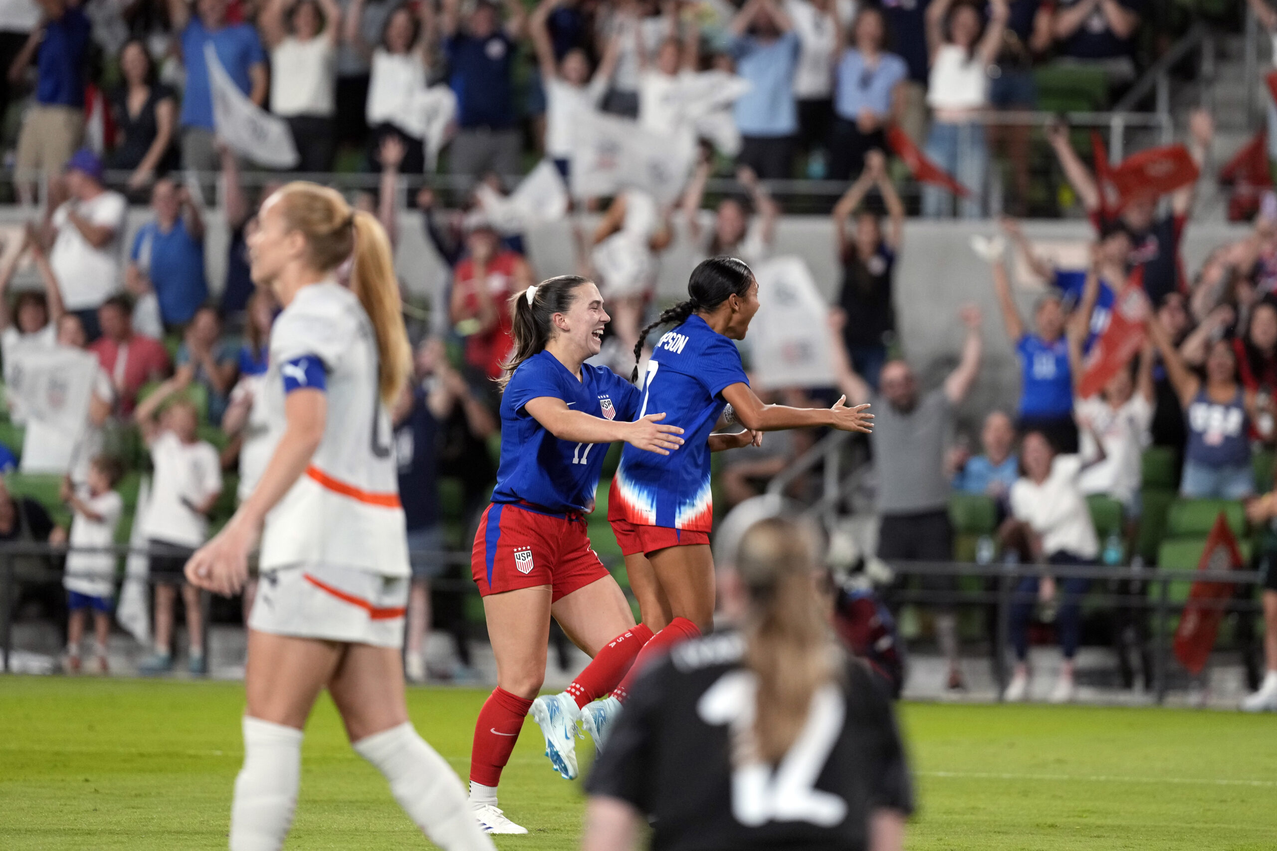 Celebrating after Alyssa Thompson's goal