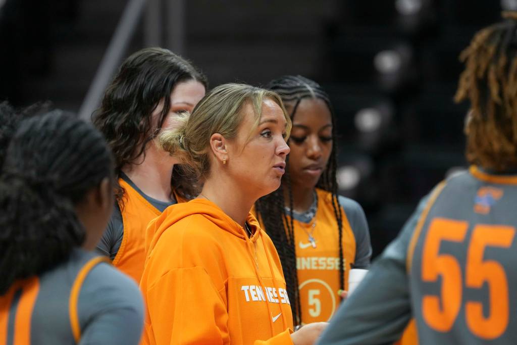 Tennessee head coach Kim Caldwell addresses her team during Tennessee's media day.