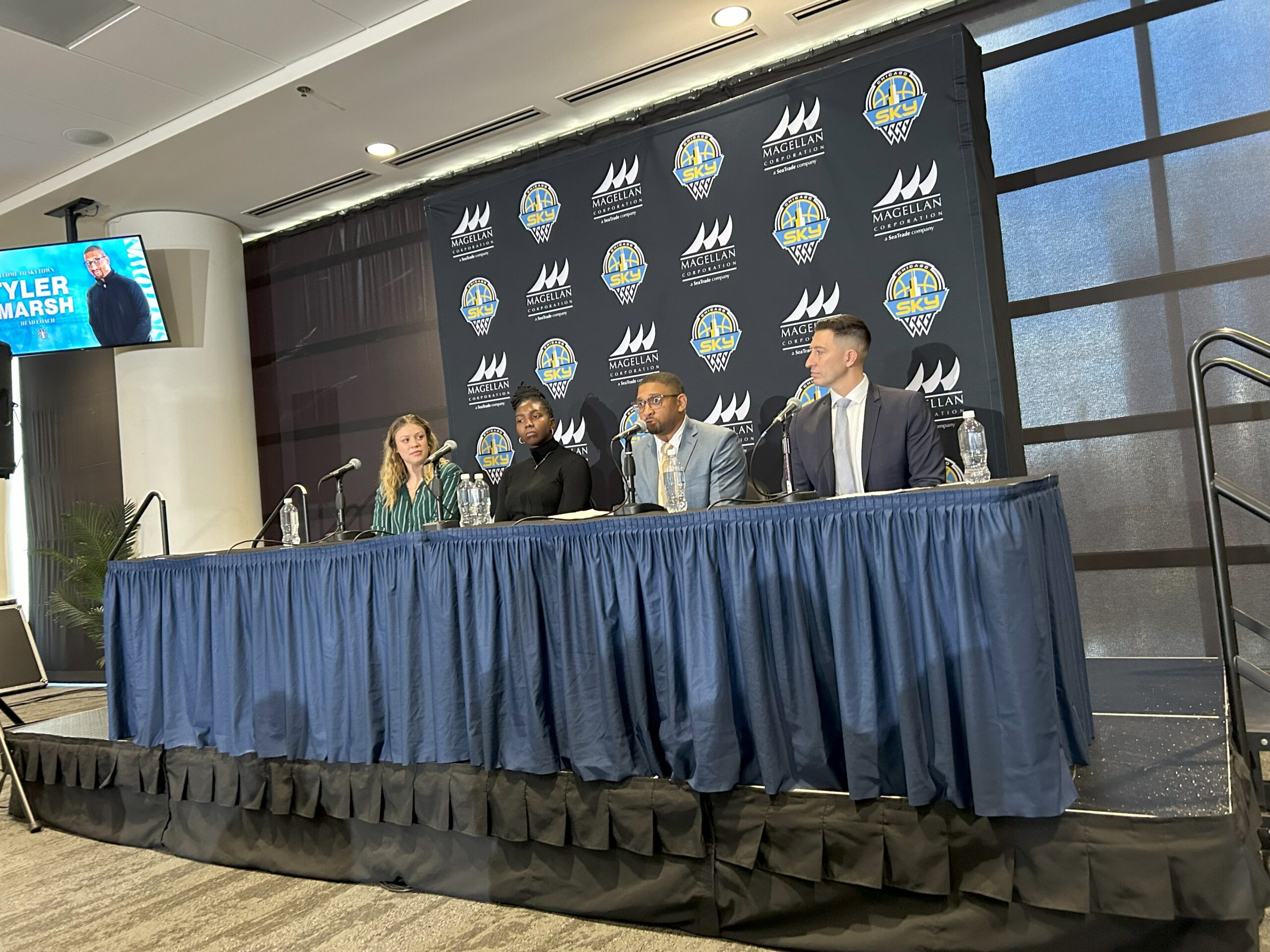 Rachel Banham, Elizabeth Williams, Tyler Marsh and Jeff Pagliocca sit next to each other at the press conference table