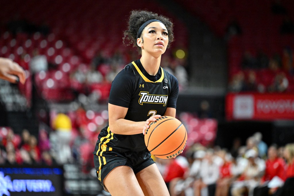 Towson's India Johnston prepares to shoot a free throw during a game against Maryland on Sunday, Nov. 17, 2024