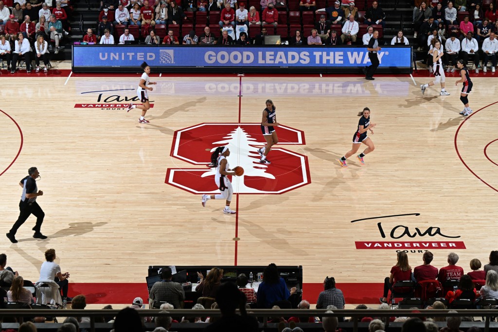 Stanford and Gonzaga players move across the court at Maples Pavilion
