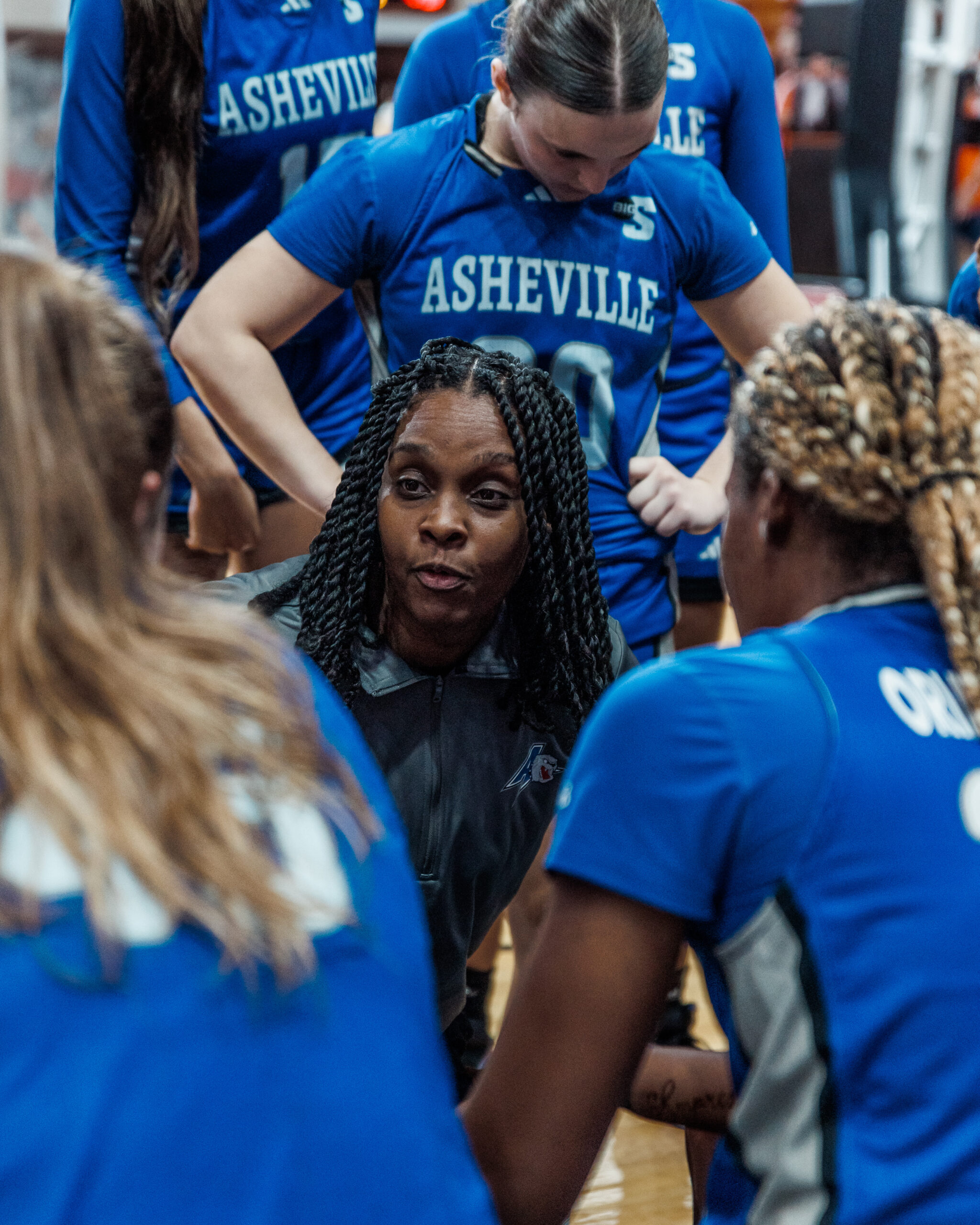 First-year head coach Tynesha Lewis shares words with her team during a game at Virginia Tech on Wednesday, November 13, 2024