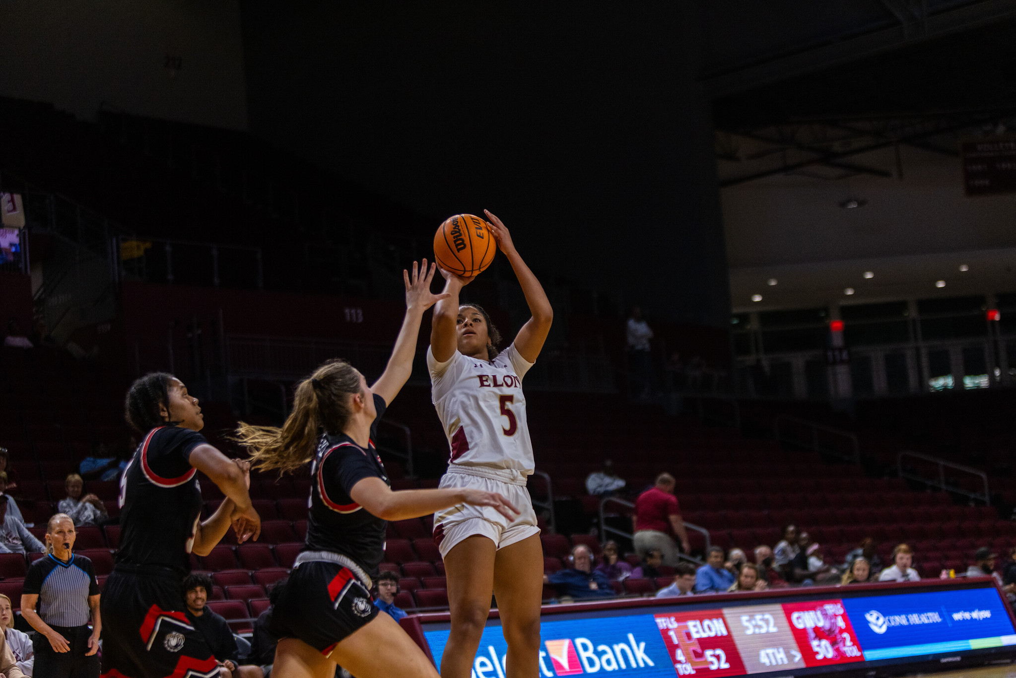 Elon's Raven Preston shoots over a pair of Gardner-Webb defenders during a non-conference game on Friday, November 8, 2024.