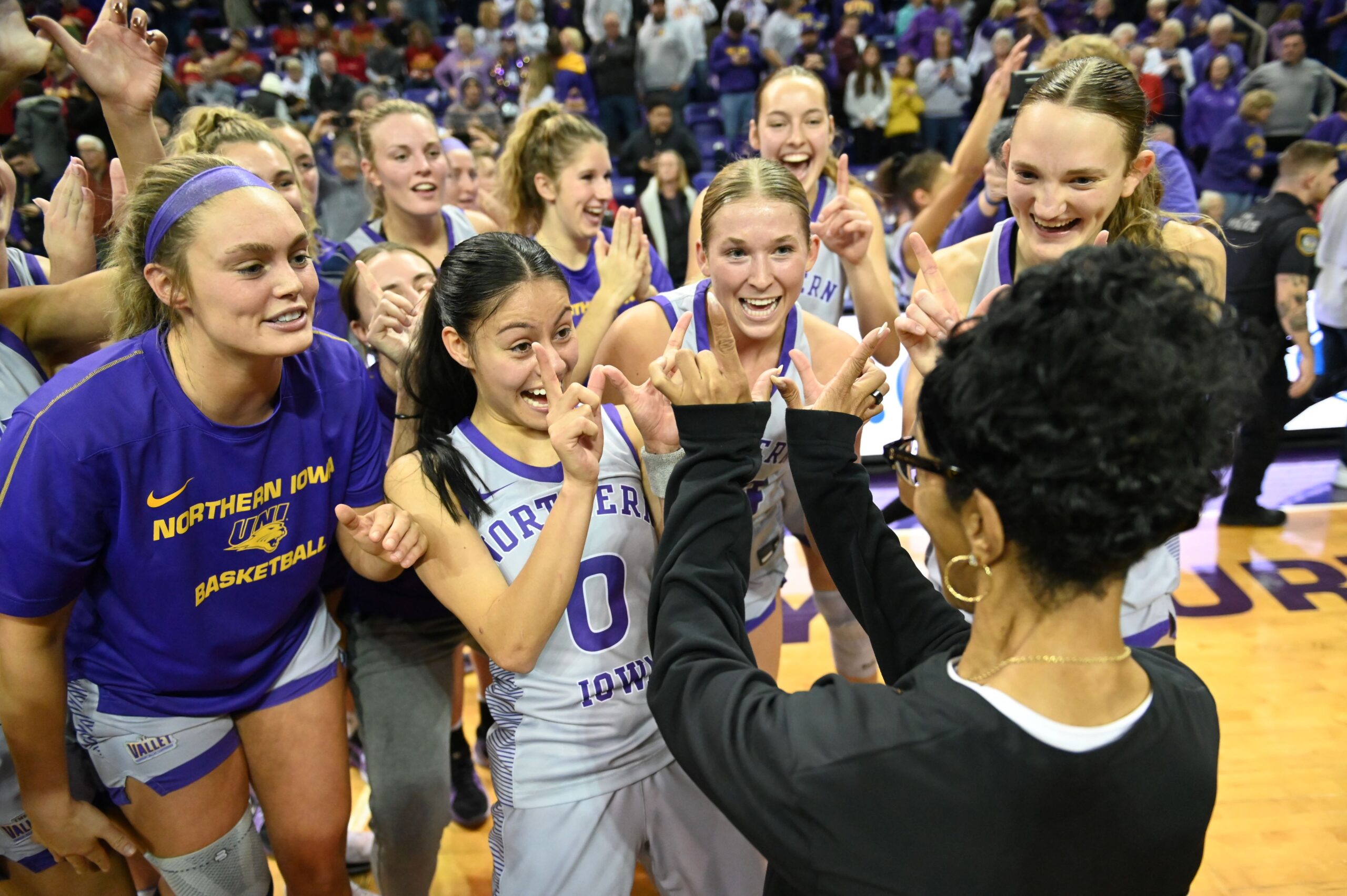 University of Northern Iowa's Maya McDermott celebrates with head coach Tanya Warren.