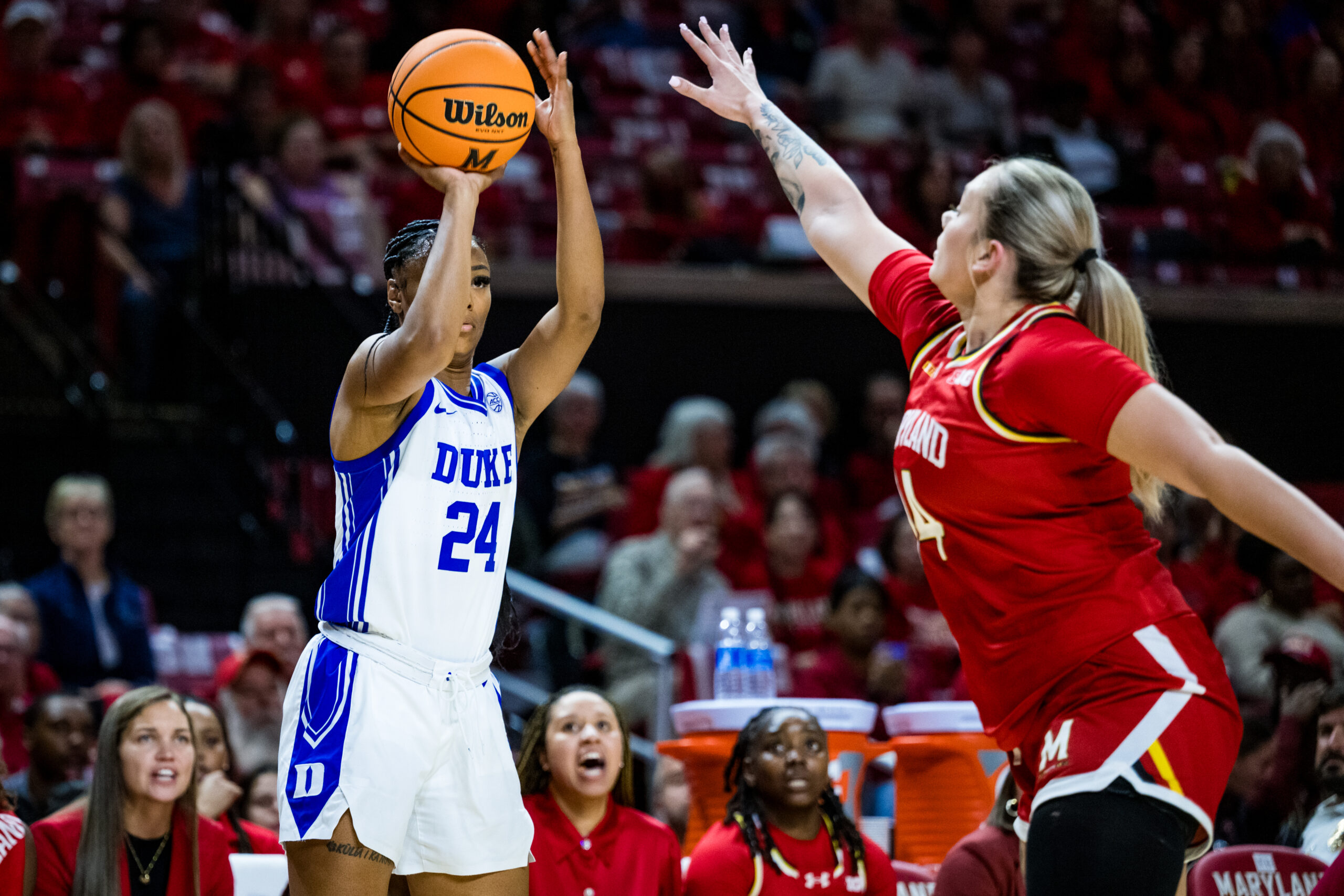 Duke's Reigan Richardson takes a shot as Maryland's Allie Kubek defends during a non-conference game on Nov. 10, 2024.