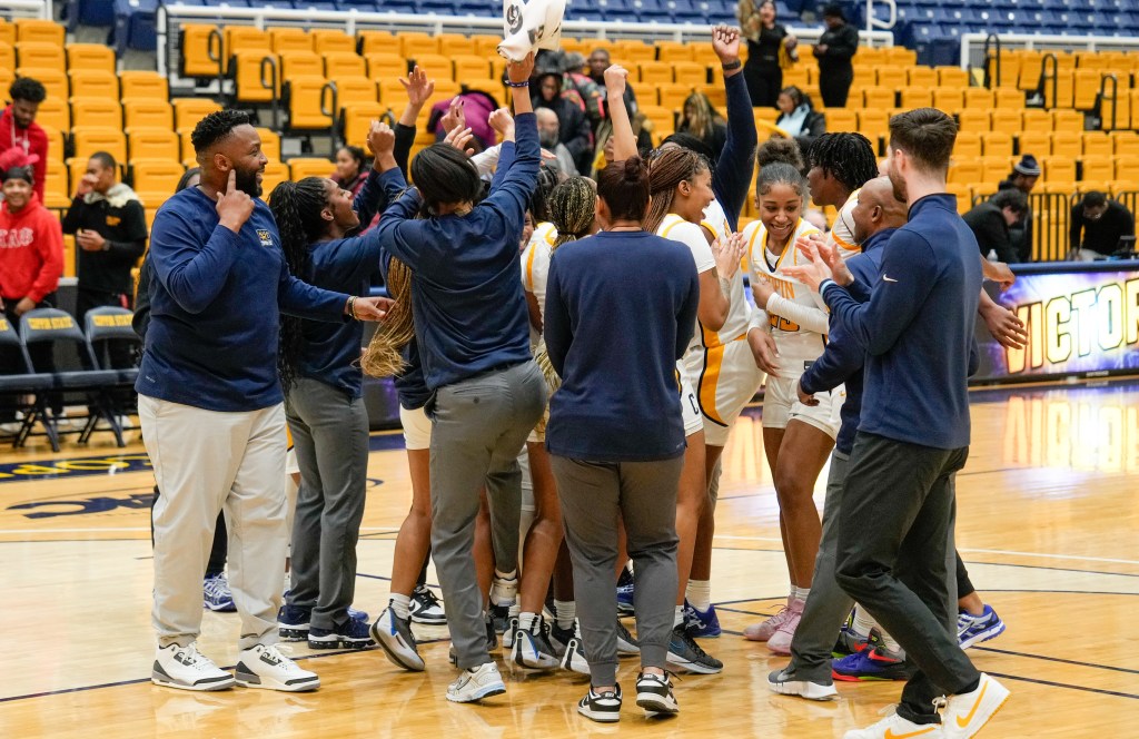 Coppin State celebrates a win over Arizona State on Dec. 5, 2024.