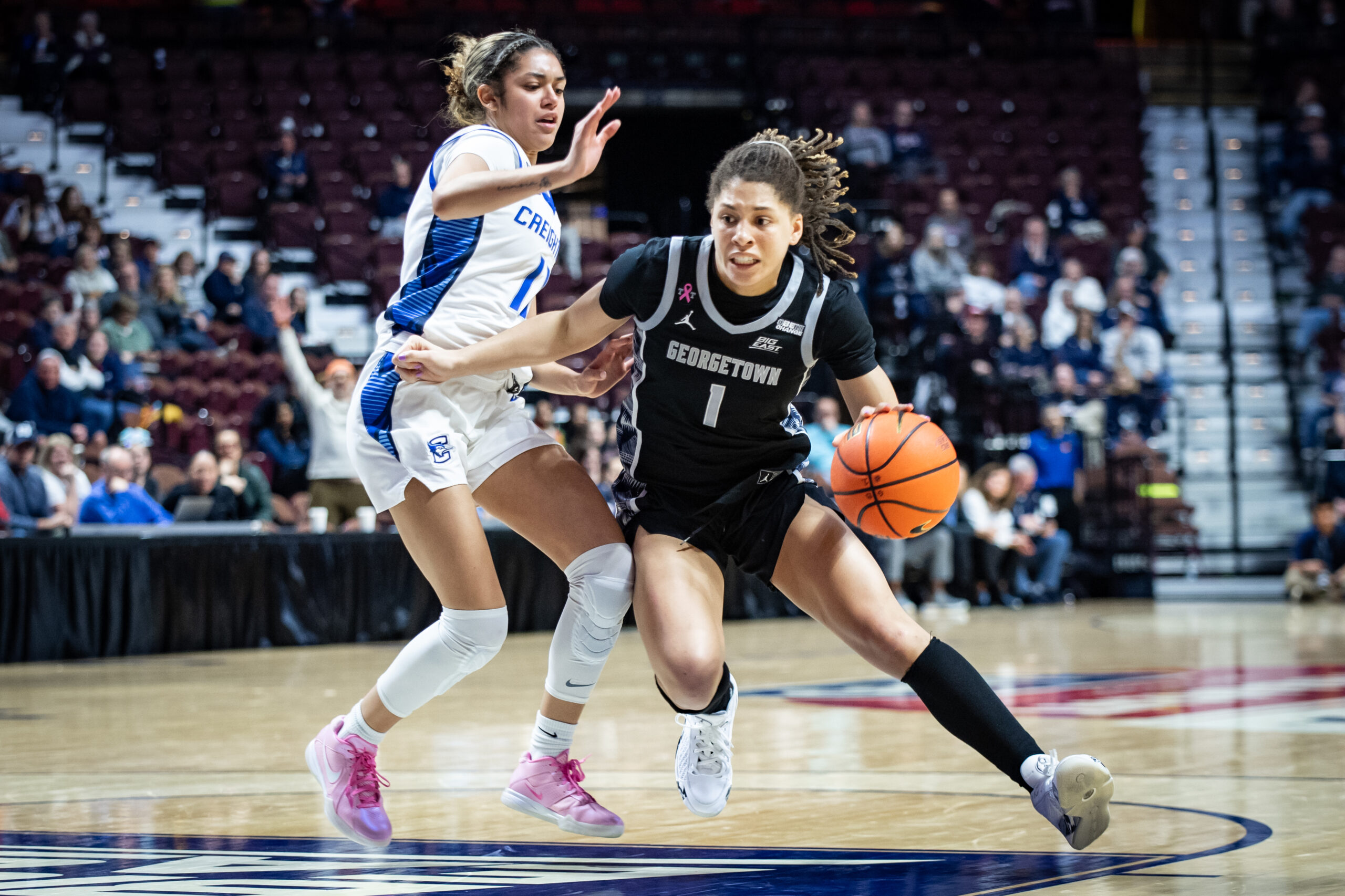 Kelsey Ransom drives to the basket against a Creighton defender