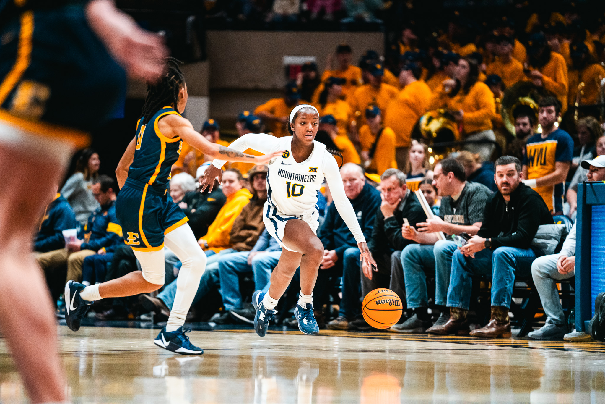West Virginia guard Jordan Harrison dribbles the ball up the floor against East Tennessee State in a game on Friday, Dec. 6, 2024. (Photo credit: West Virginia Athletic Communications)