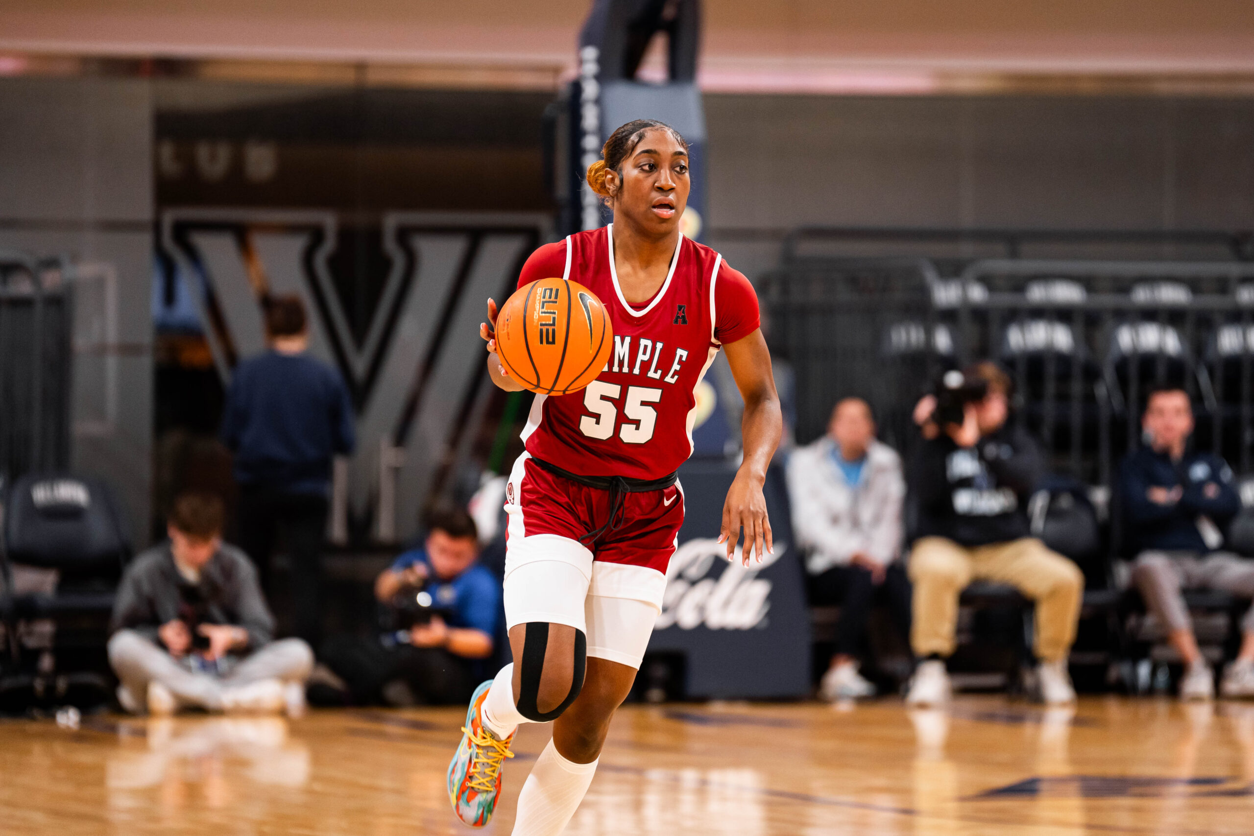 Temple guard Tiarra East brings the ball up the floor in a game against Villanova on Friday, Dec. 5 in the Big Five Classic championship game.