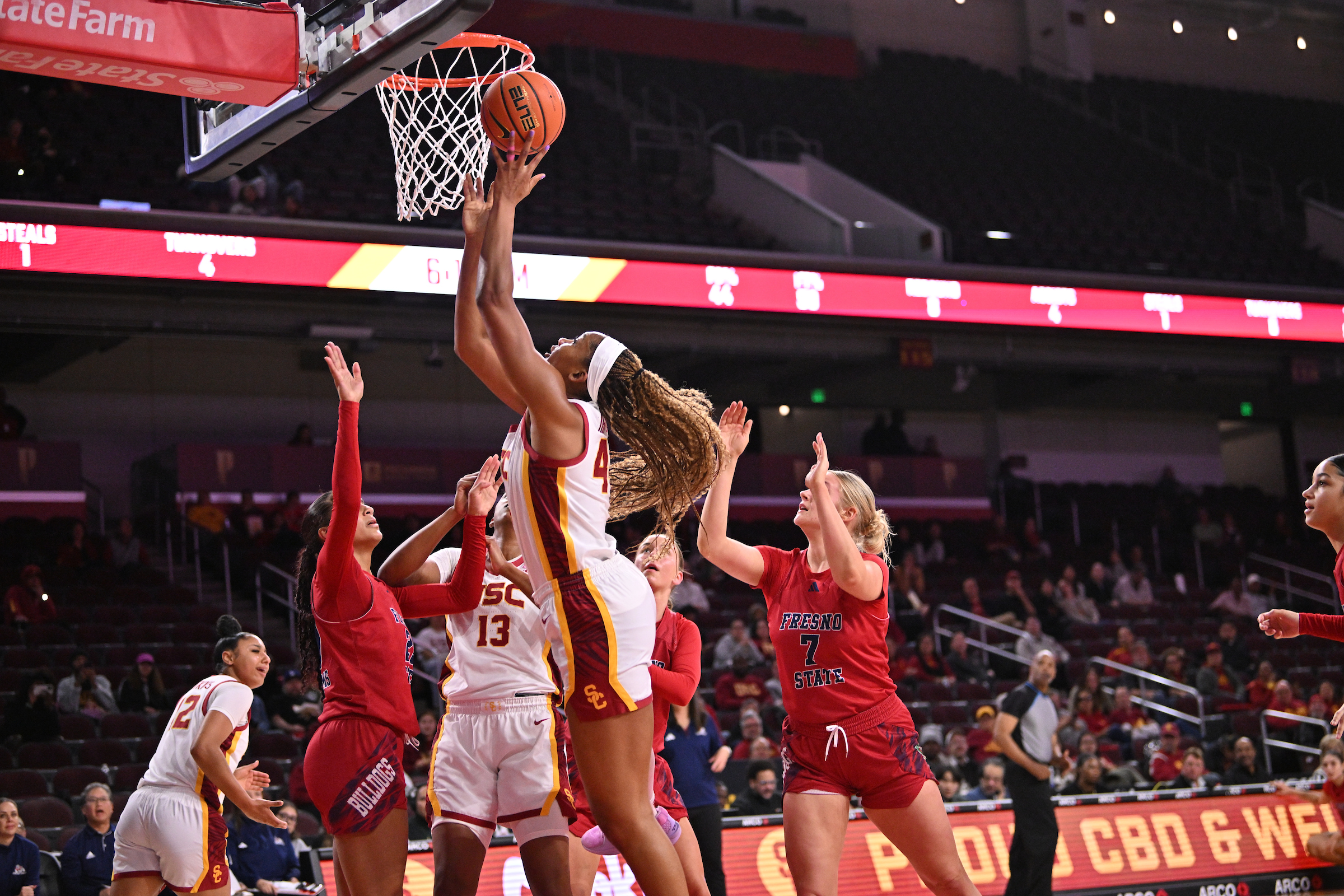 USC forward Kiki Iriafen drives to the basket against Fresno State on Dec. 10, 2024.