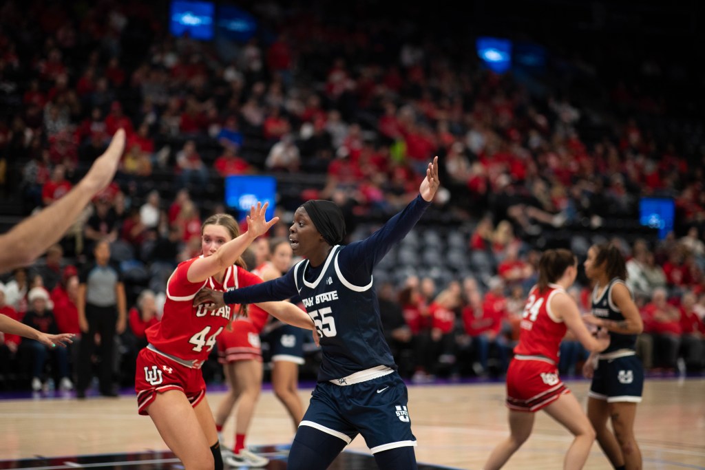 Sophie Sene tries to create separation in the post against Utah.