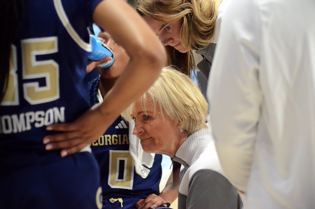 Georgia Tech coach Nell Fortner talks to her team during a timeout.