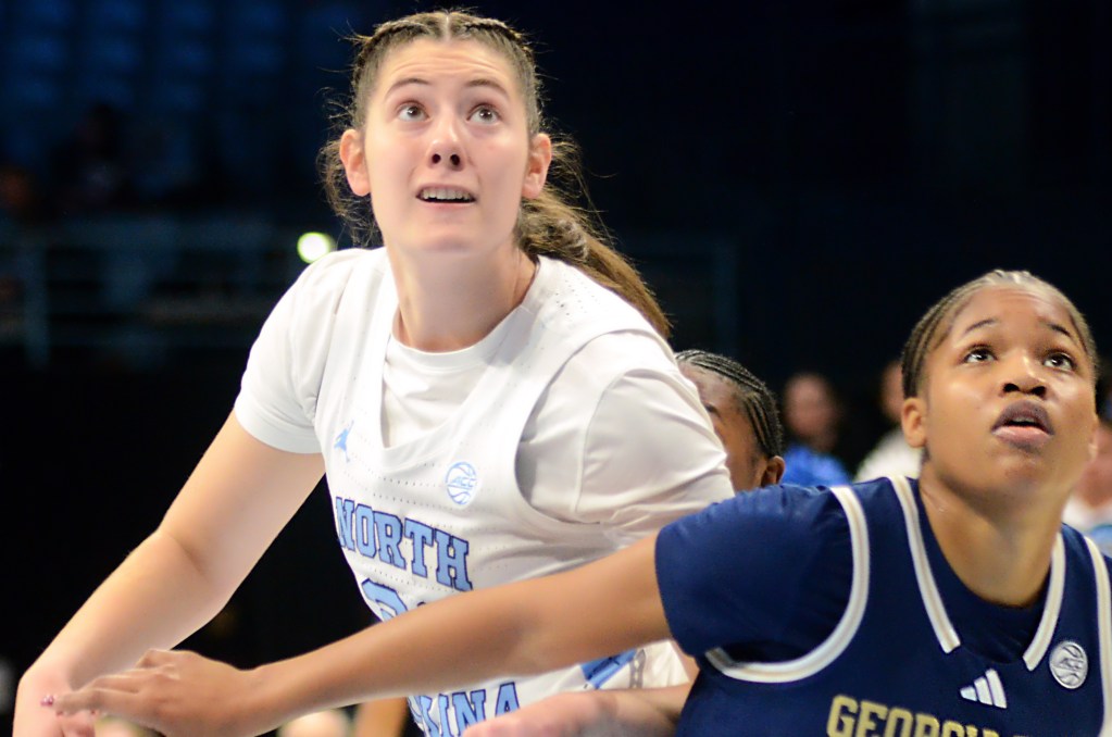 Georgia Tech's Kara Dunn (right) boxes out UNC's <a rel=