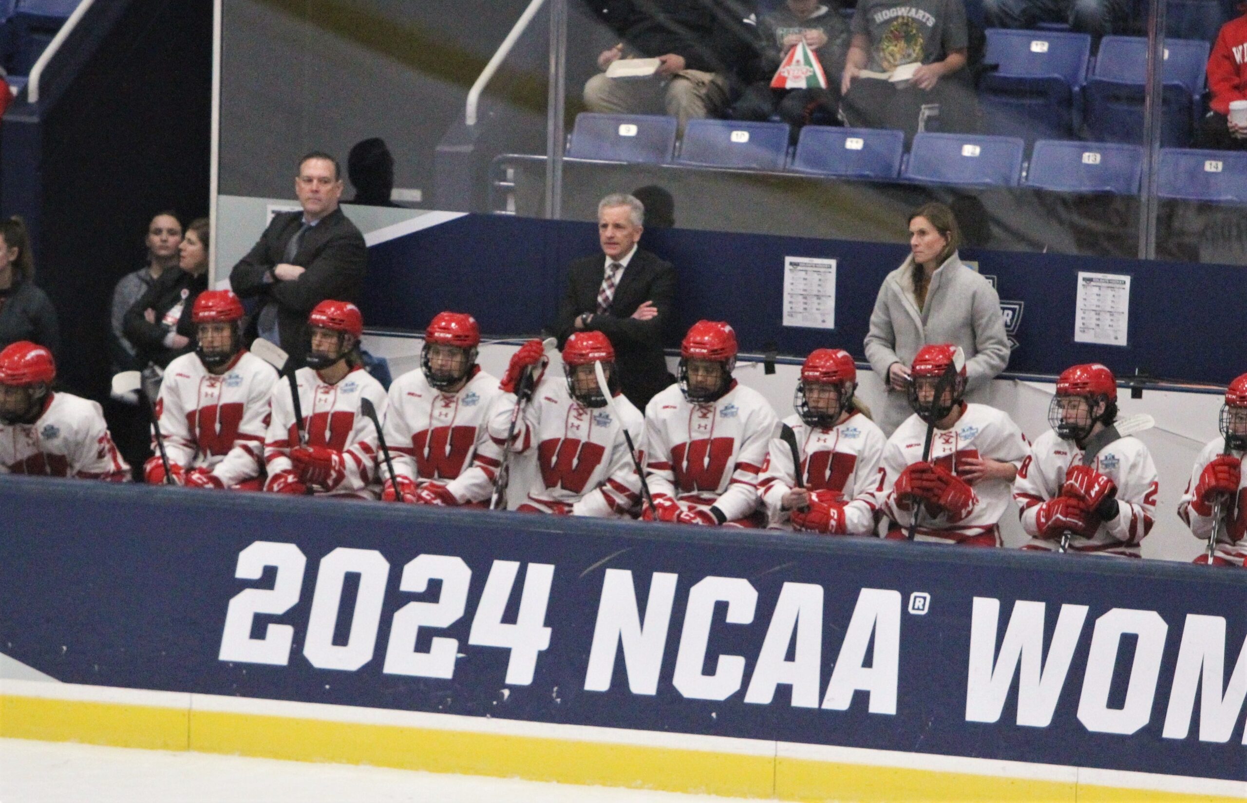 Wisconsin Badgers women's hockey team bench is pictured at the 2024 NCAA women's hockey national semifinal