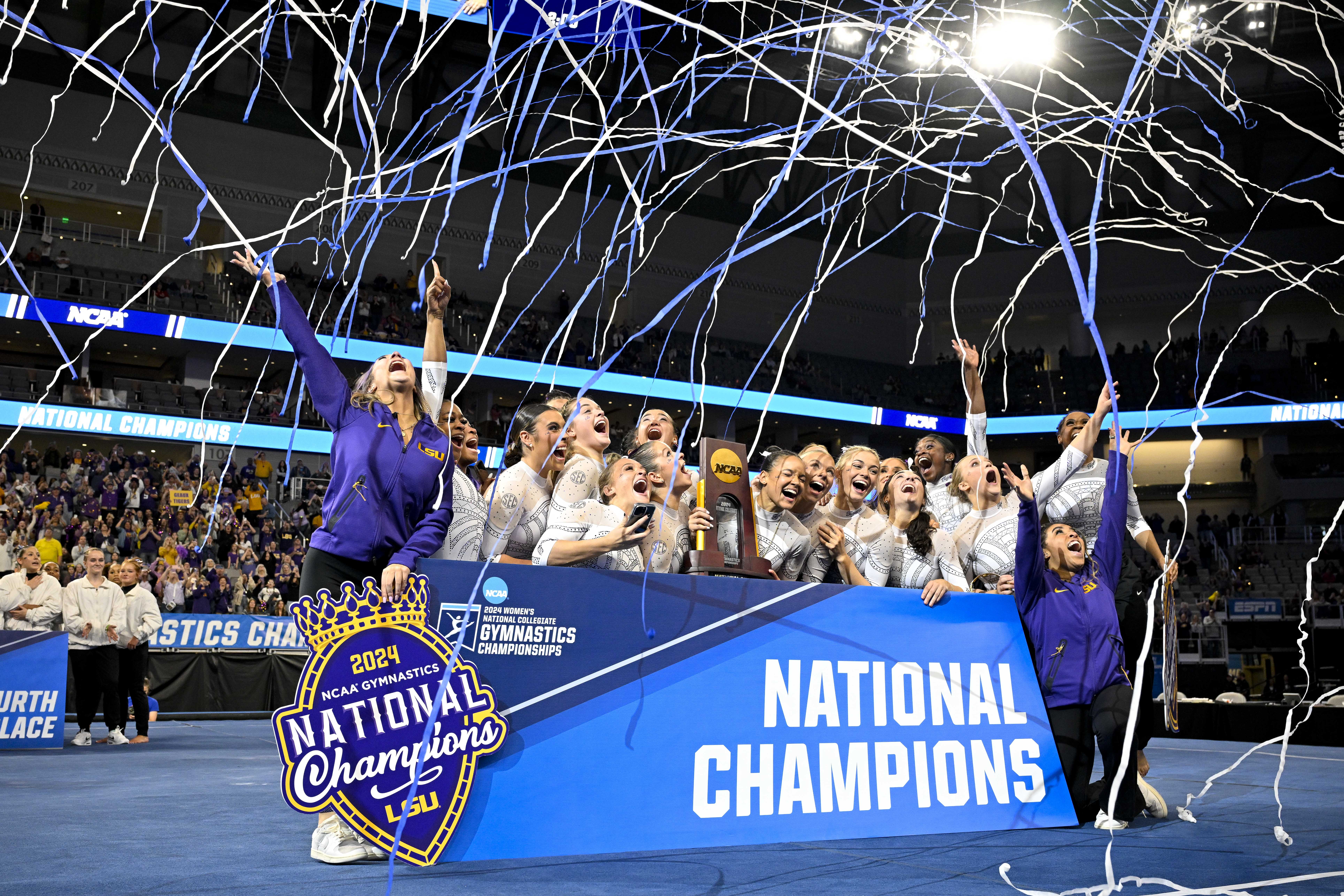 The LSU women's gymnastics team celebrates its victory at the 2024 NCAA championships.