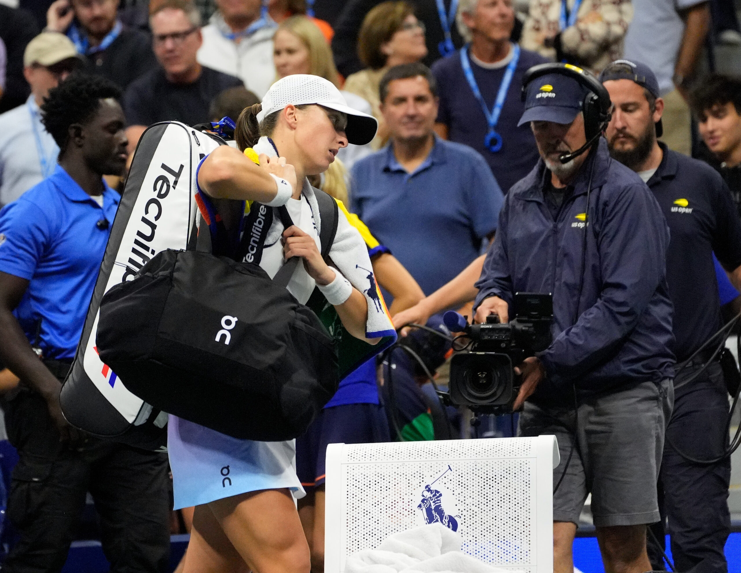 Iga Swiatek walks off the court at the 2024 U.S. Open