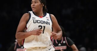 Sarah Strong runs down the court.