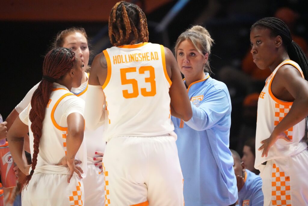 Kim Caldwell instructs her team.