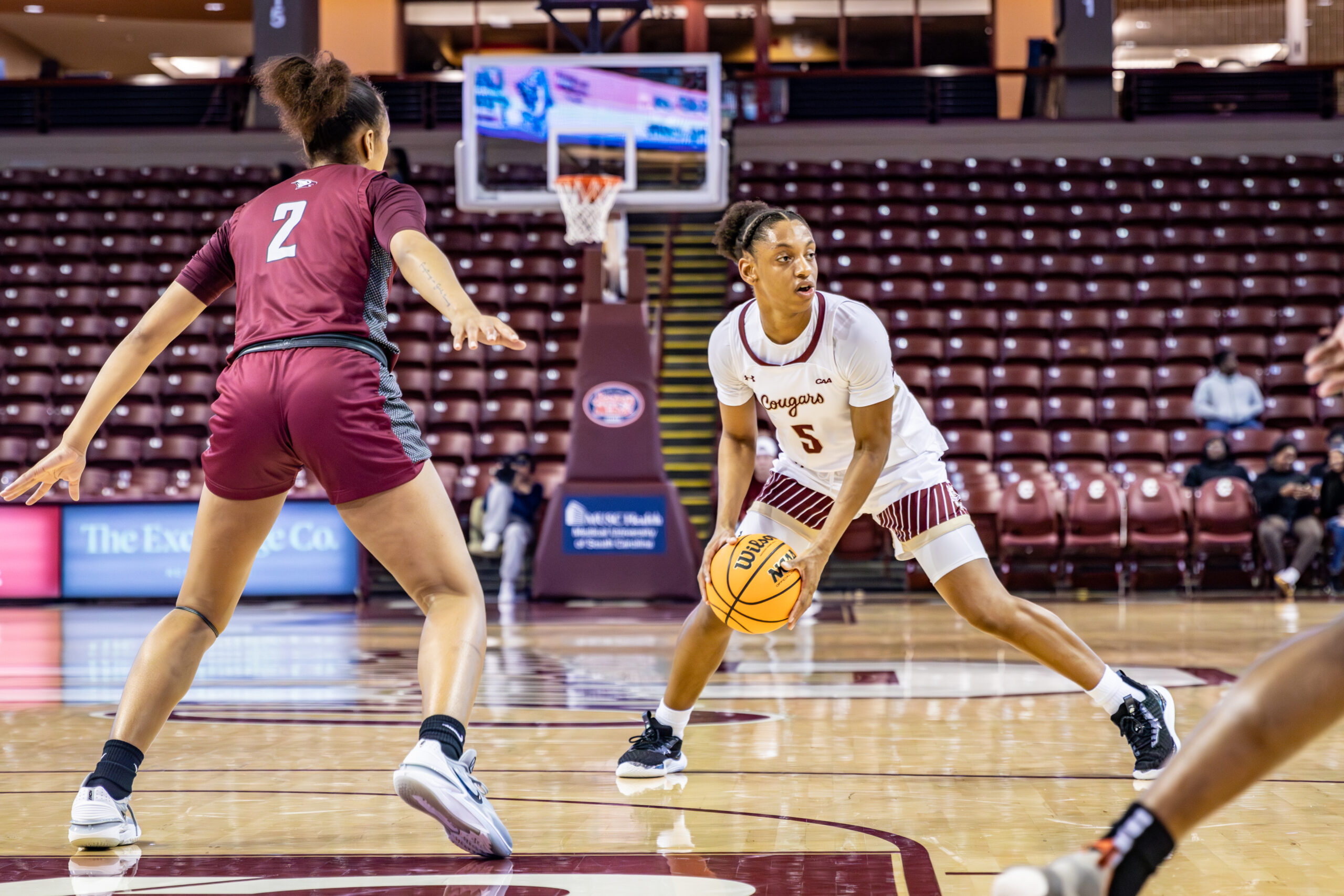 College of Charleston's Taryn Barbot looks to pass in a game against North Carolina Central on November 13, 2024.