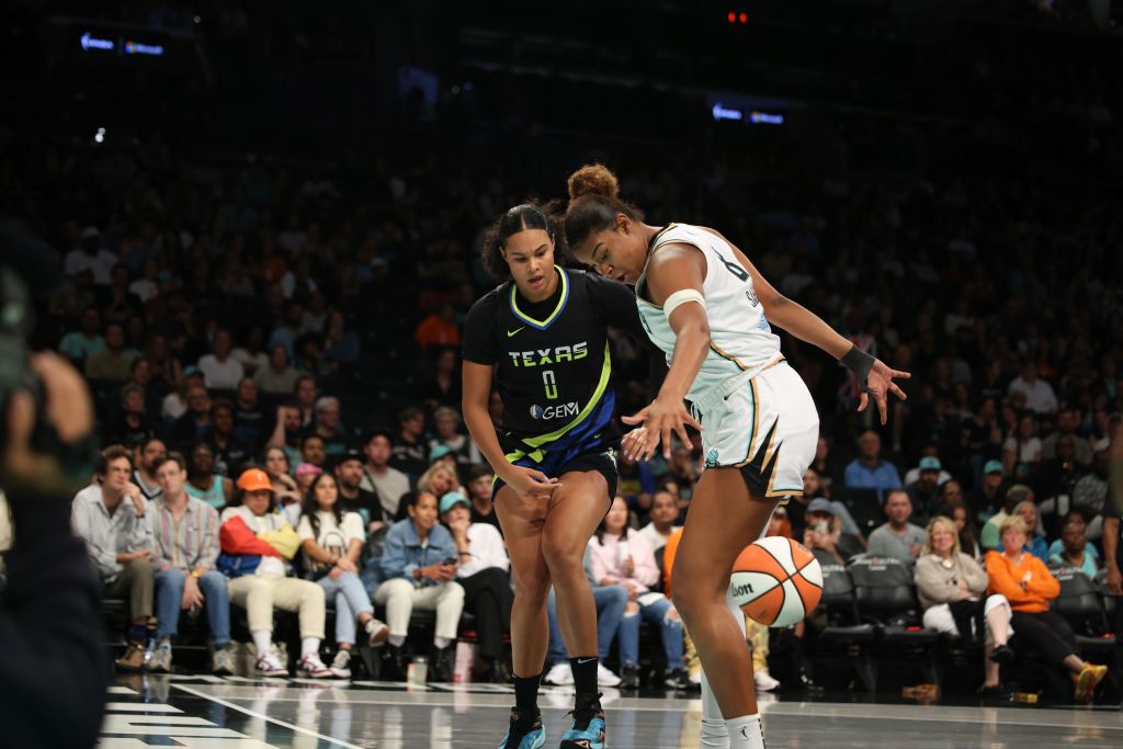 Satou Sabally and Nyara Sabally battle for the ball at Barclays Center