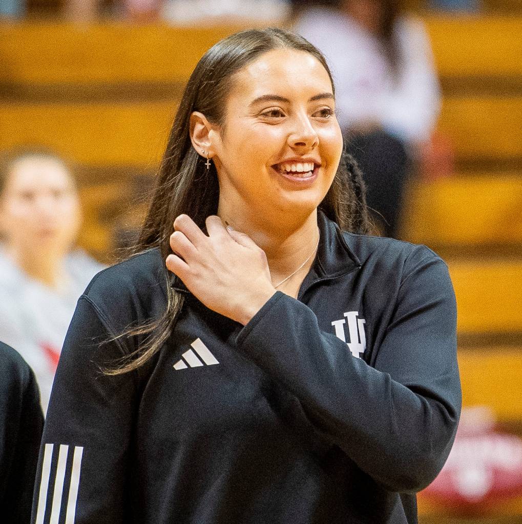 Mackenzie Holmes smiles on the court at Assembly Hall.