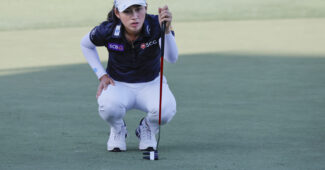 Jeeno Thitikul lines up a putt on the course during the Grant Thornton Invitational.