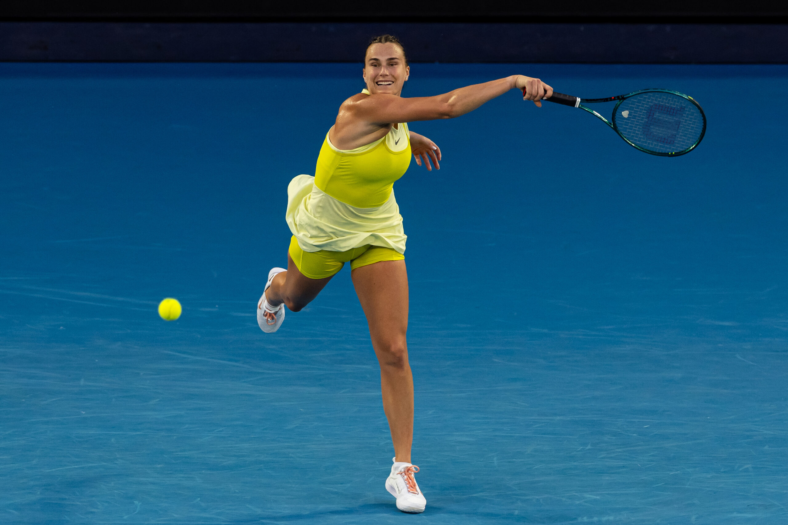 Aryna Sabalenka hits a forehand in her first round match at the 2025 Australian Open
