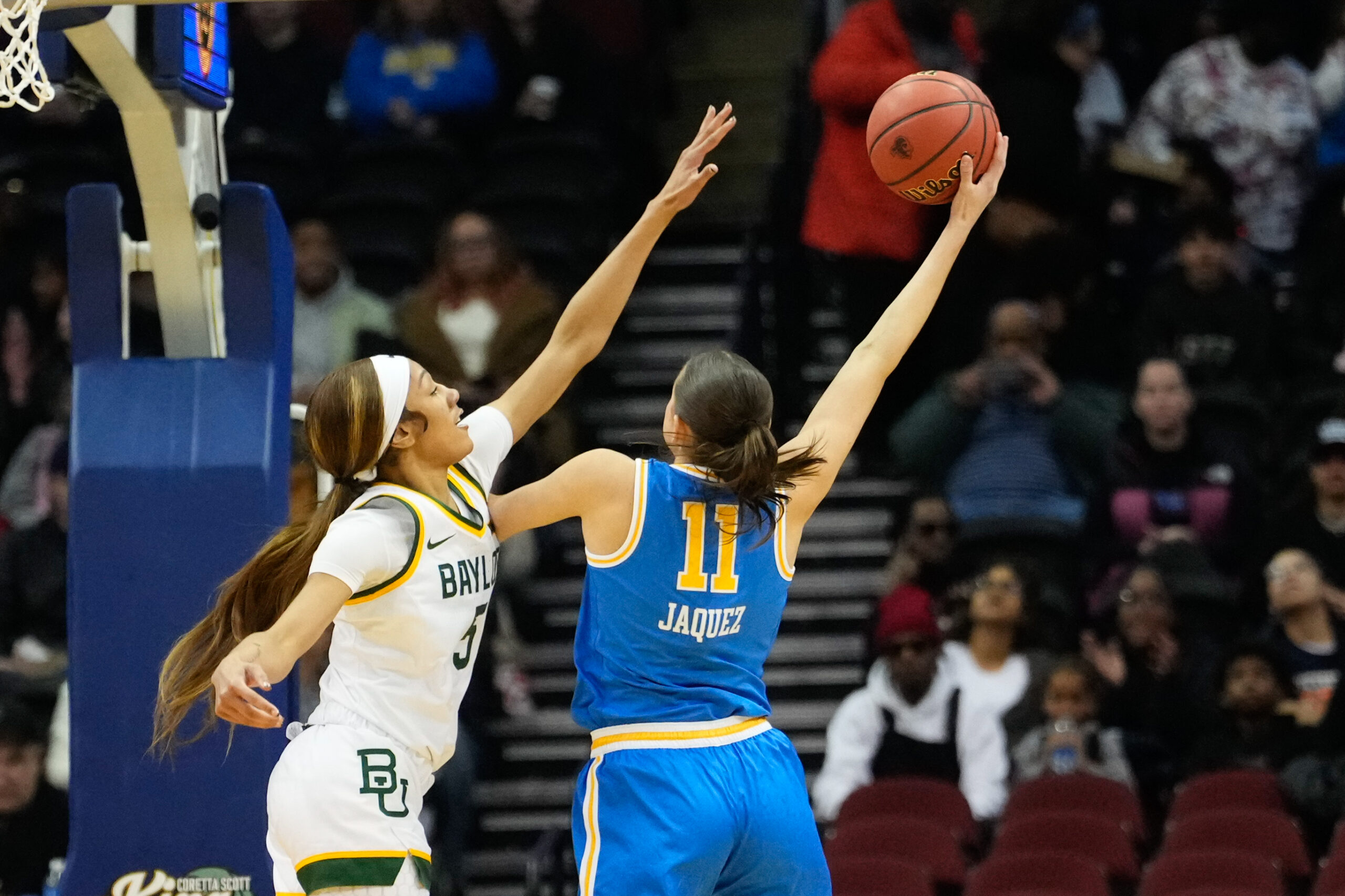 Gabriela Jaquez scores a basket against Baylor Lady Bears guard Darianna Littlepage-Buggs