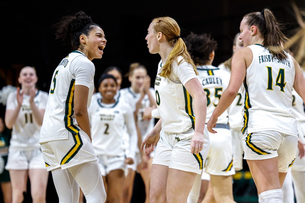 Bella Nascimento gets her teammates fired up during a game earlier this season. (Photo credit: William & Mary Athletics)