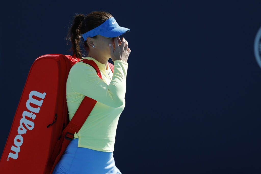 Simona Halep walking on court at the 2024 Miami Open