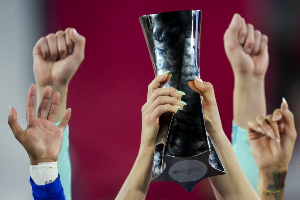 Apr 9, 2024; Columbus, Ohio, USA;  United States players hold the trophy as they celebrate after defeating Canada in penalty kicks at Lower.com Field. Mandatory Credit: Aaron Doster-USA TODAY Sports