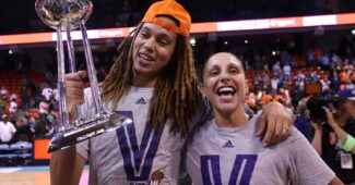 Diana Taurasi, Brittney Griner and a trophy.