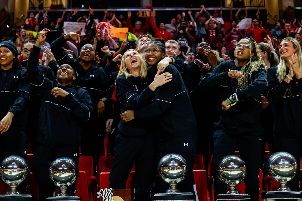 Maryland head coach Brenda Frese hugs Shyanne Sellers after learning their NCAA draw. (Photo credit: University of Maryland Athletics)
