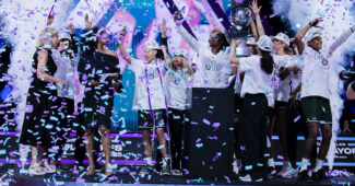 Rose BC players celebrate amid the confetti.