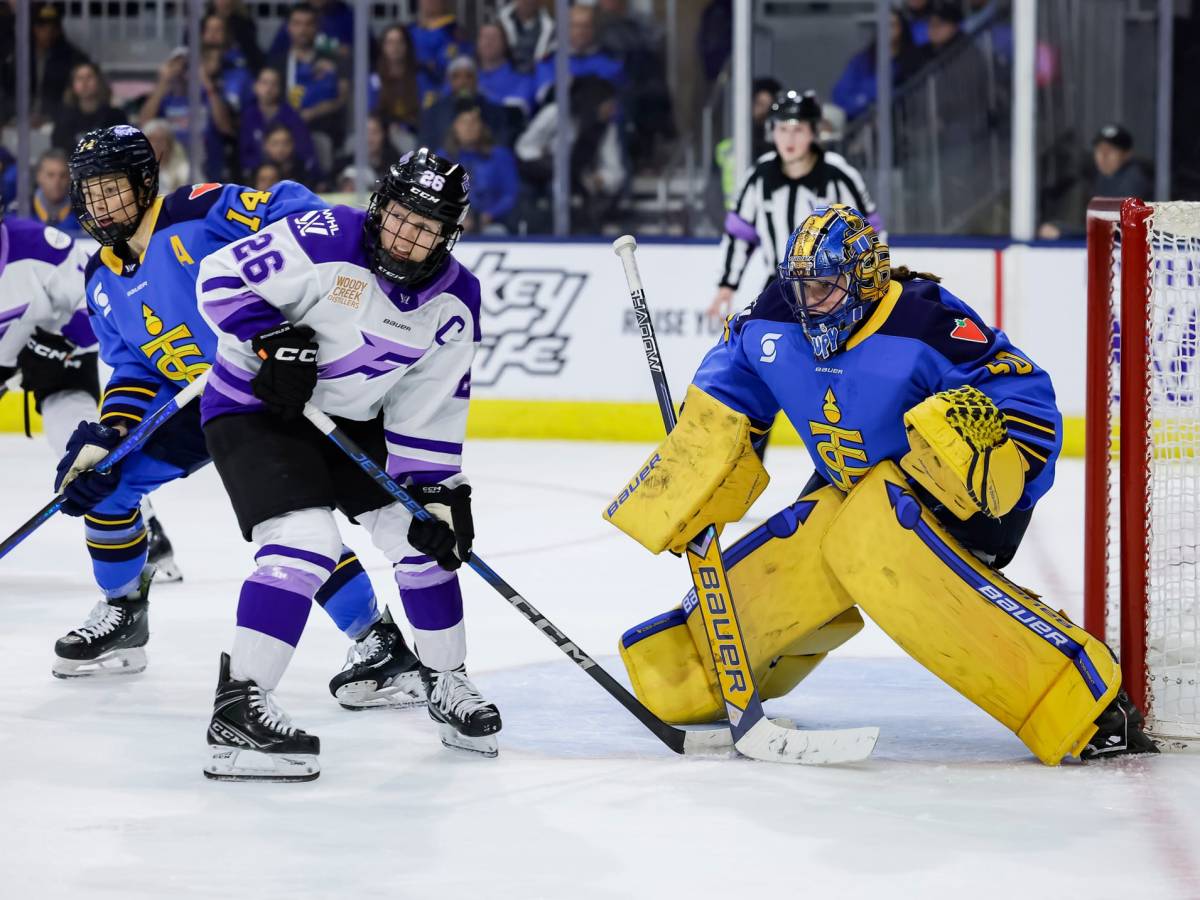 Kendall Coyne Schofield with Kristen Campbell looking at an on coming shot (Photo Cred: PWHL)