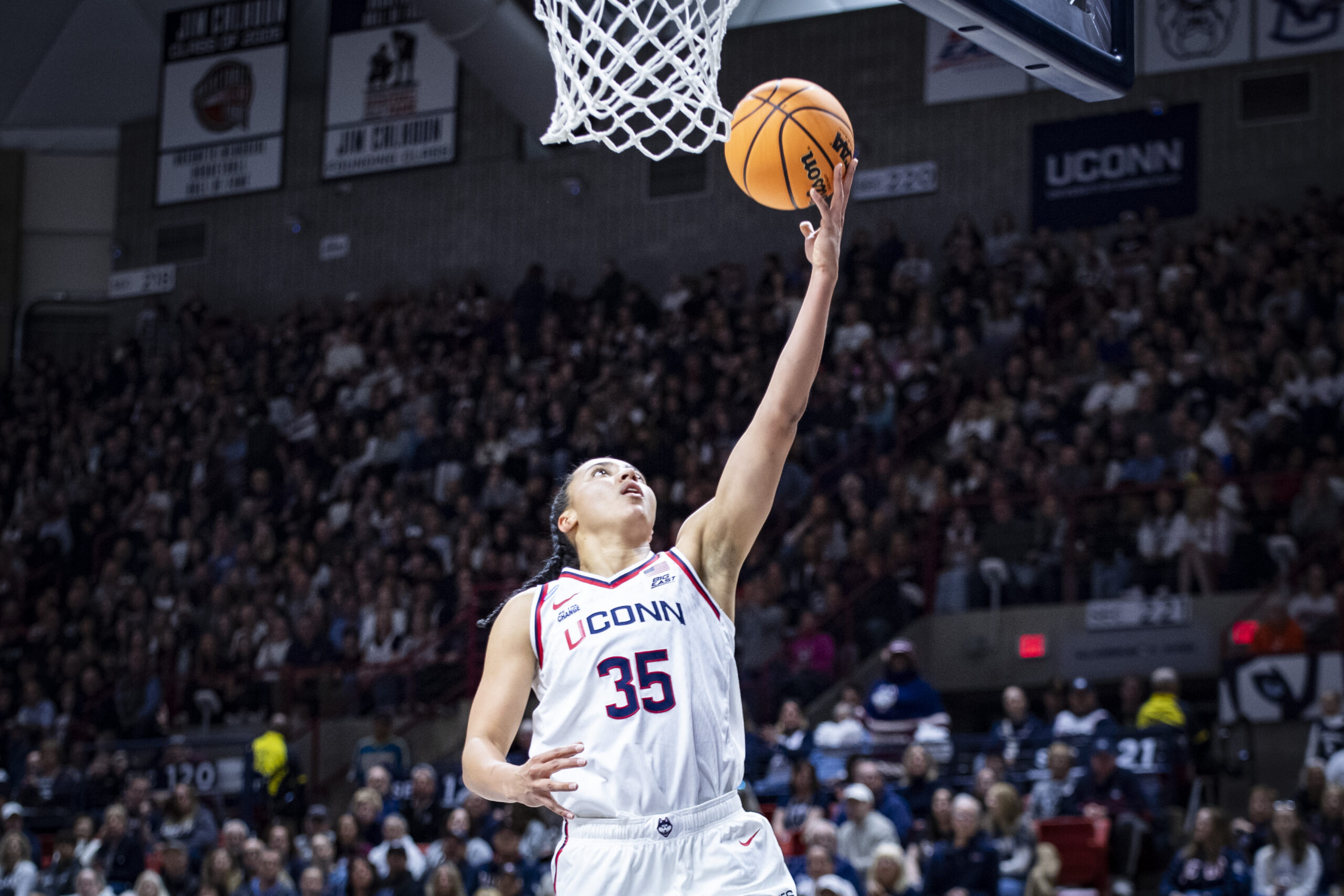 Azzi Fudd drives to the basket for a layup