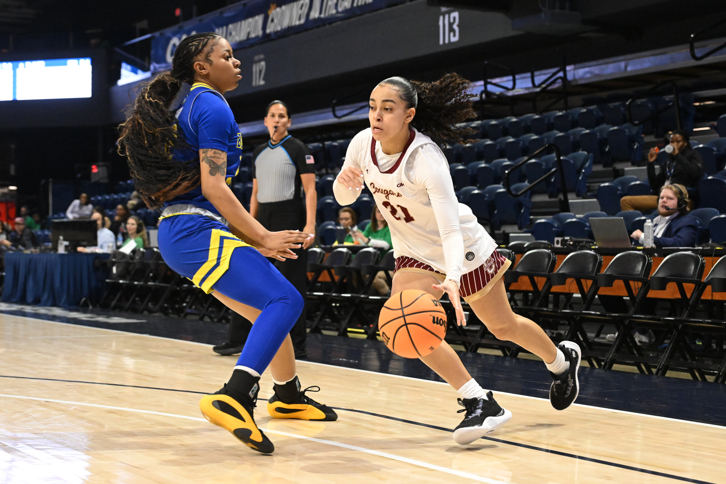 Jazmyn Stones drives to the basket in a game against Delaware. (Photo credit: CAA)