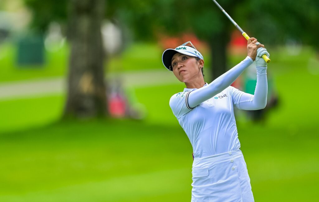 Lydia Ko follows through with the golf club after hitting a shot