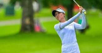 Lydia Ko follows through with the golf club after hitting a shot