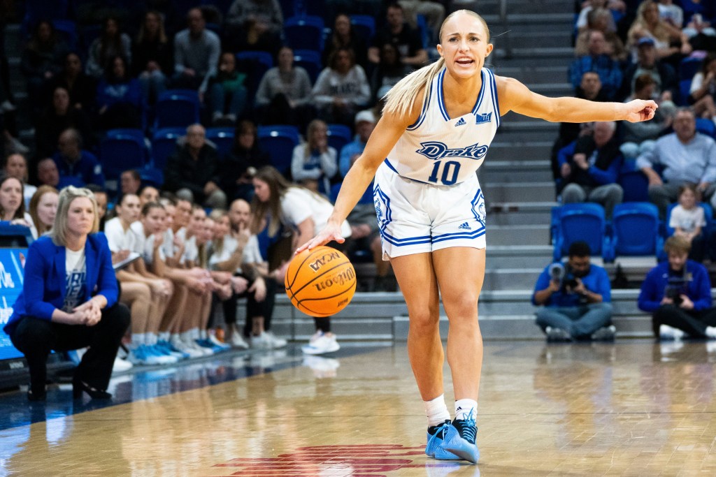 Drake guard Katie Dinnebier leads the way. 
