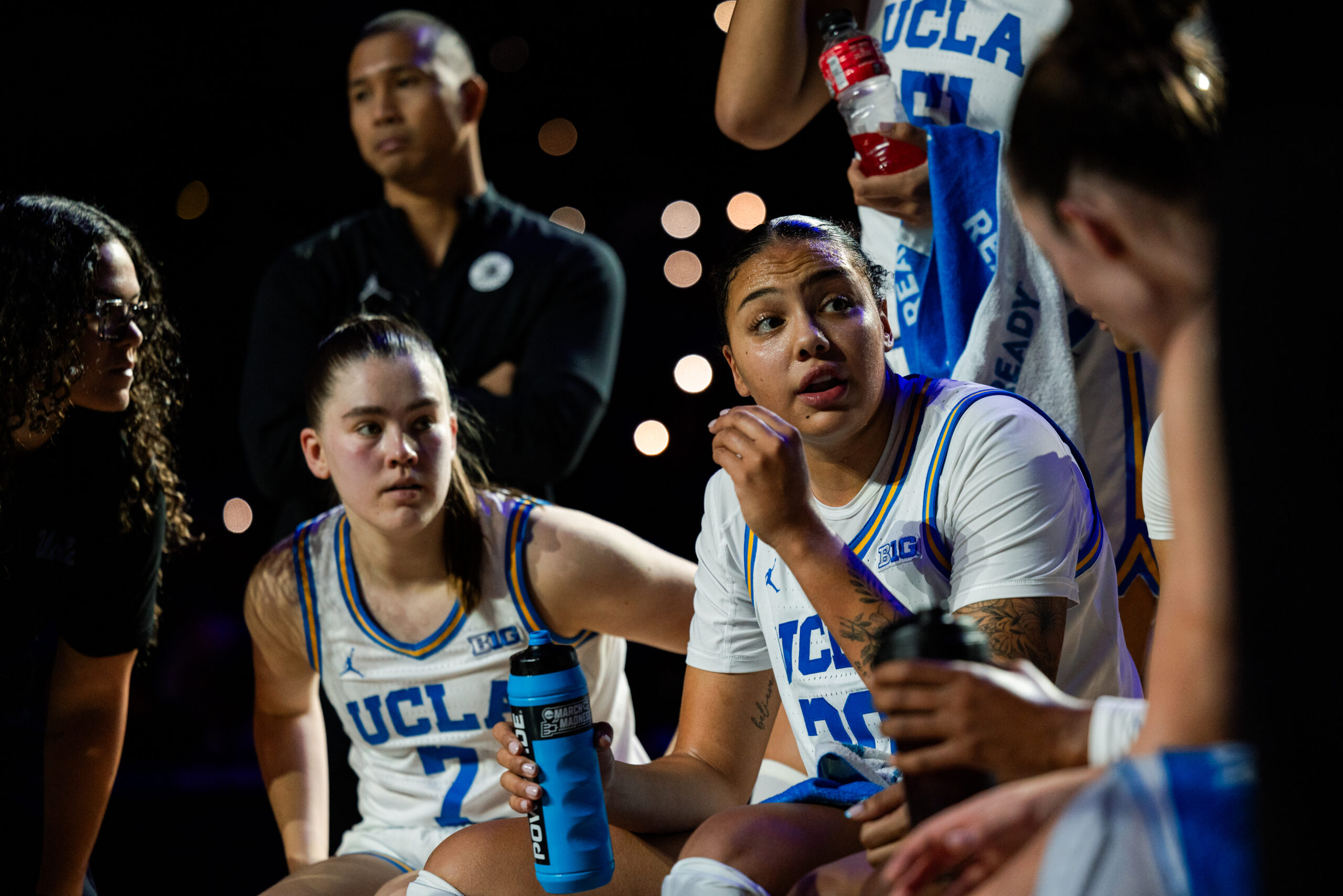 UCLA forward Timea Gardiner talks to her teammates in the huddle during a game.