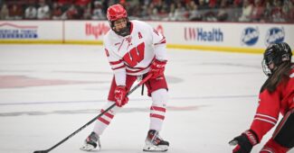 Wisconsin Badgers forward Laila Edwards looks to pass